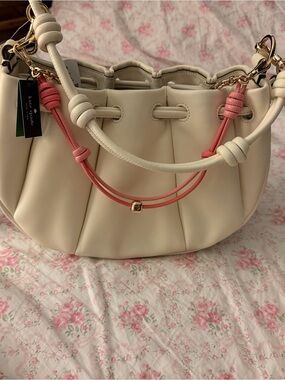 kate spade Cream Crossbody Bag with Pink Accent